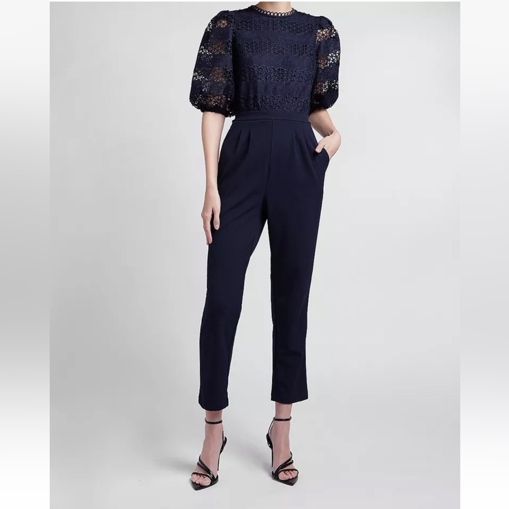 Worn Once navy blue jumpsuit, beautiful, feminine and delicate, very flattering